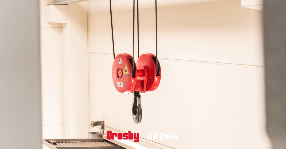 Crane trolley with a double sheave lifting hook. This lifting system allows lifts up to 12 ton (24,000 lbs) 